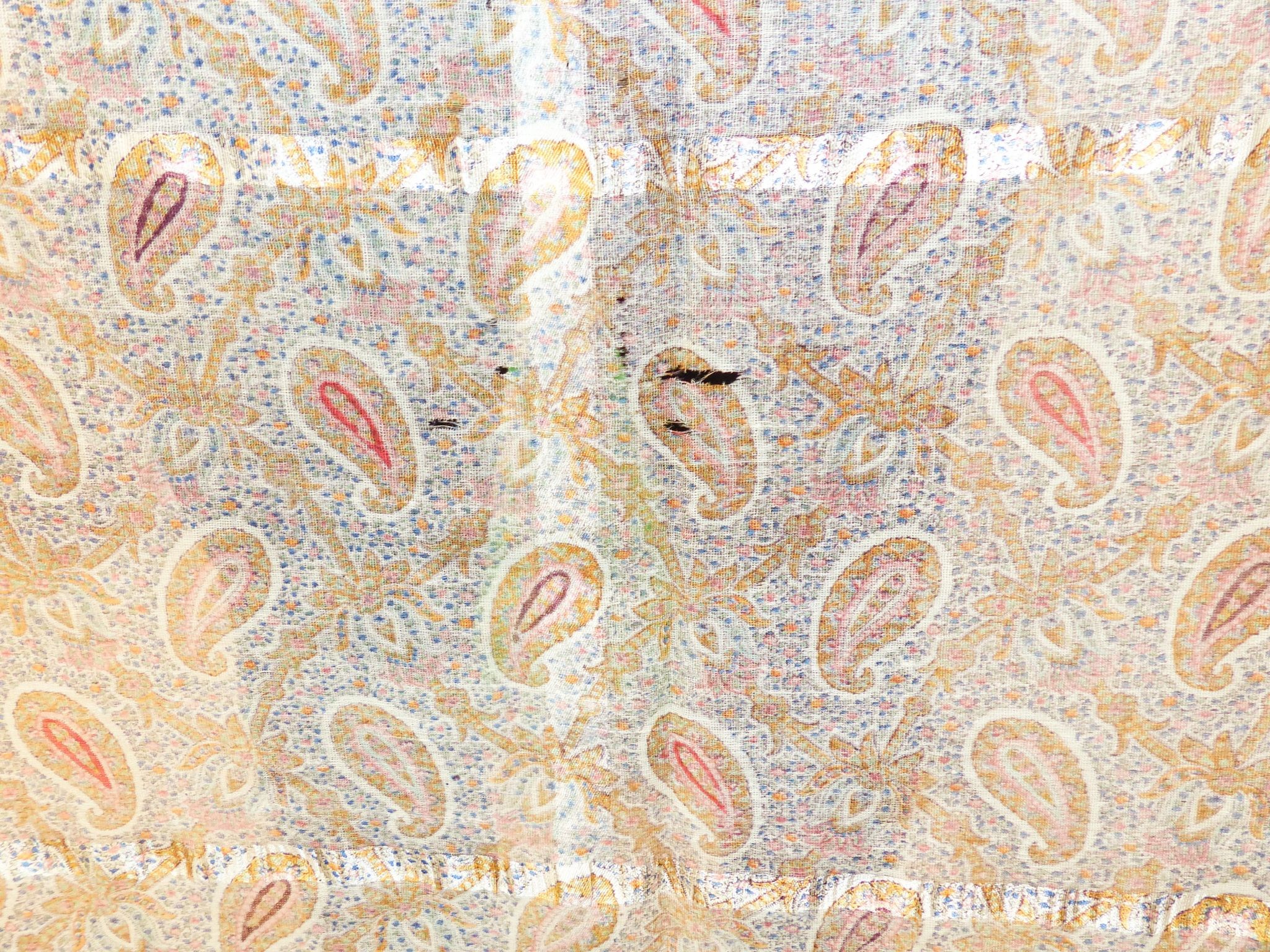 A Paisley pattern silk shaw (damaged) together with two Kelim woven bags (3)